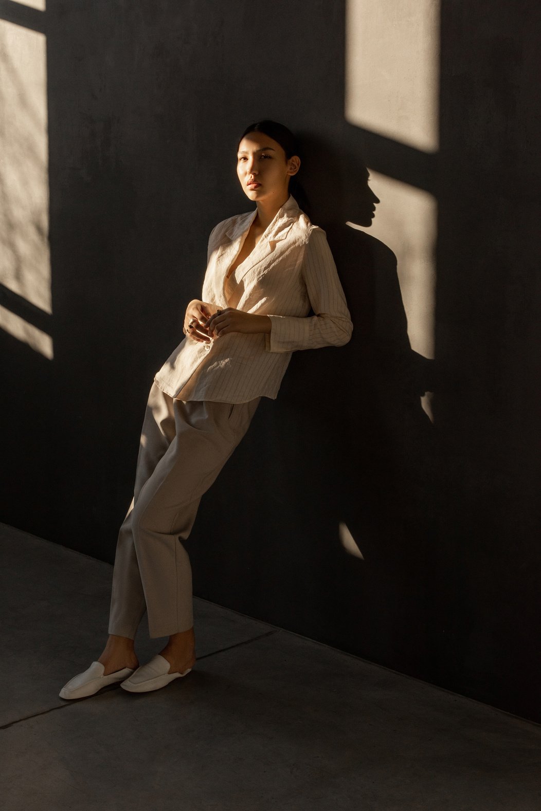 Photo Of Woman Leaning On The Wall